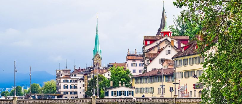 Zurich, Switzerland circa June 2021: Streets and historic Old Town buildings near main railway train station Zurich HB, Hauptbahnhof, Swiss architecture and travel destination