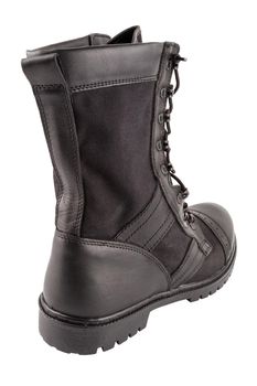 new black summertime lightweight military boot with nylon parts isolated on white background.