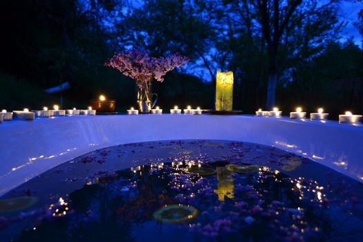 Romantic evening background with bathtub outdoor