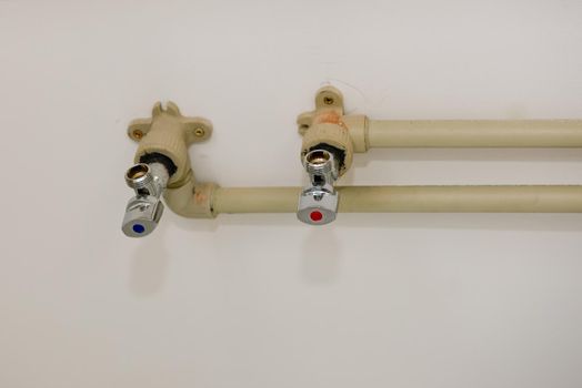 Method of installation of plastic water pipes in an apartment. Close-up.