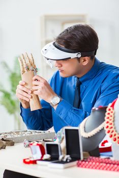 Jeweler working with luxury jewelry in the workshop
