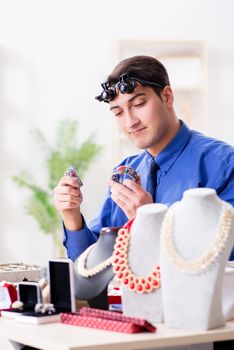 Jeweler working with luxury jewelry in the workshop