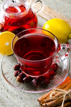 Fruit berry tea in the cup served on table