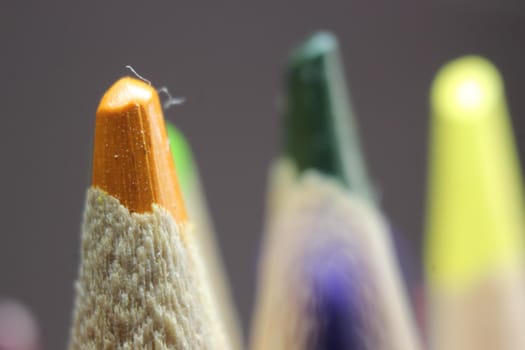 close up of sharpened pencil.Macro view of the tip of the pencil on a black background.