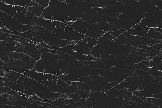Drawn white scratches on the black surface.Texture or Background