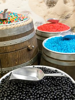 Colorful candies as background, top view