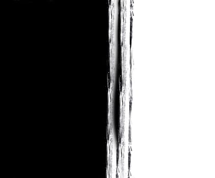 Painted black textured half on white background.Texture or Background