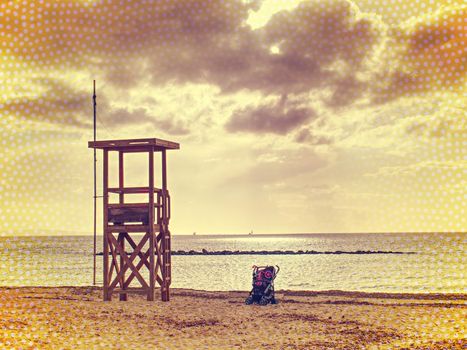 Watchtower at the Beach, calm sea in the bay. Abstract. 