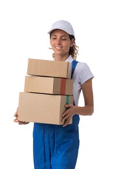 Portrait of happy smiling delivery woman with stack of boxes isolated on white background