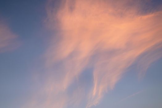 Low angle view to sky with feathery clouds at sunset