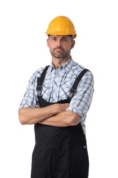 Portrait of a workman in coveralls and yellow hardhat isolated on white background