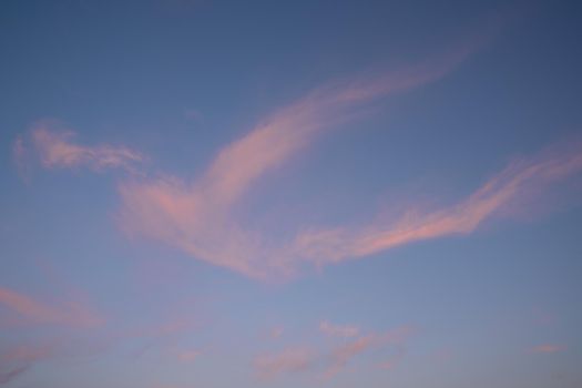 Low angle view to sky with feathery clouds at sunset