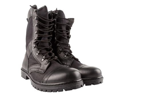 pair of new black summertime lightweight military boots with nylon parts isolated on white background