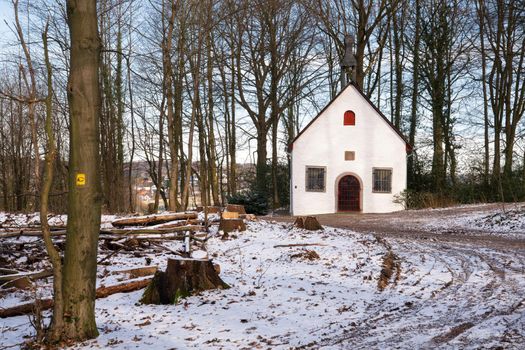 Old chapel on the long distance hiking trail Bergischer Panoramasteig close to Lindlar on a winter day, Germany