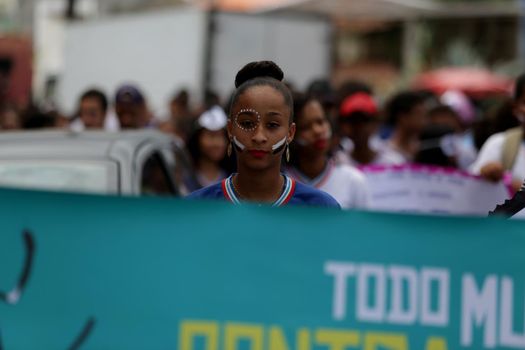 salvador, bahia, brazil - november 30, 2018: Students from the public school during a march in Salvador to raise awareness of the dangers of Aedes aegypti, a mosquito that causes dengue and zica.

