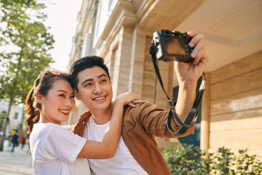 Happy tourists taking photo of themselves 