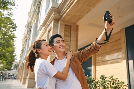 Happy tourists taking photo of themselves 