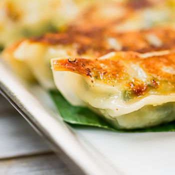 Dumplings with spinach, gyoza served as appetizer on plate in luxury asian restaurant, japanese food and vegetarian menu concept.