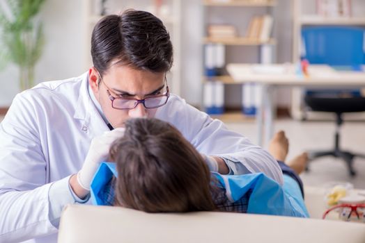 Patient visiting dentist for regular check-up and filling