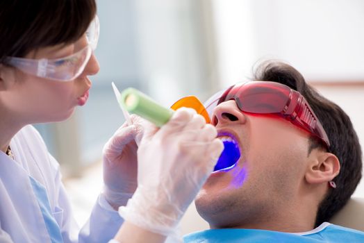 Patient visiting dentist for regular check-up and filling