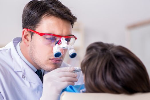 Patient visiting dentist for regular check-up and filling