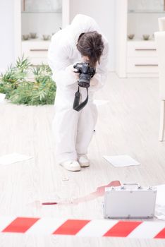 Forensics investigator at the scene of office crime