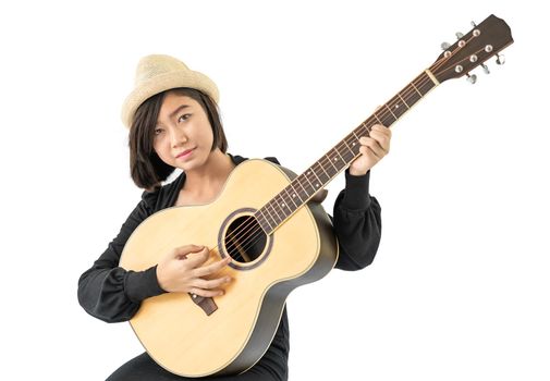 Young asia woman hold guitar guitar folk song in her hand isolate on white background