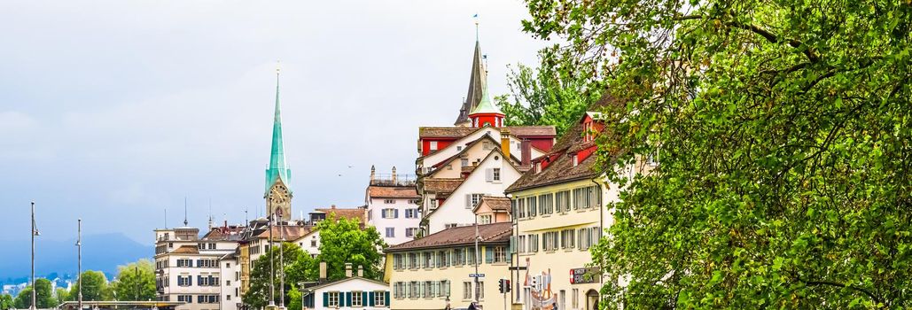 Zurich, Switzerland circa June 2021: Streets and historic Old Town buildings near main railway train station Zurich HB, Hauptbahnhof, Swiss architecture and travel destination