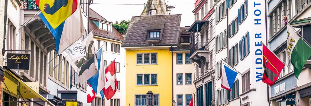 Zurich, Switzerland circa June 2021: Shopping streets and historic Old Town buildings, shops and luxury stores near main downtown Bahnhofstrasse street, Swiss architecture and travel destination