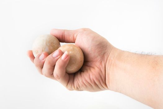 Massage stones on the palm