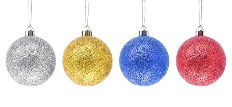 Hanging silver, golden, blue, red glitter Christmas baubles isolated on white background.