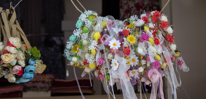 colorful crowns  for sale made of fake flowers