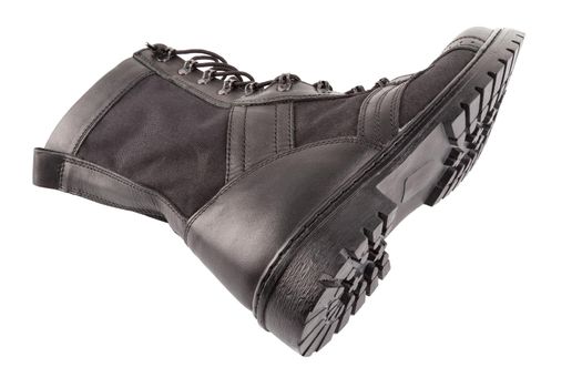 new black summertime lightweight military boot with nylon parts isolated on white background.