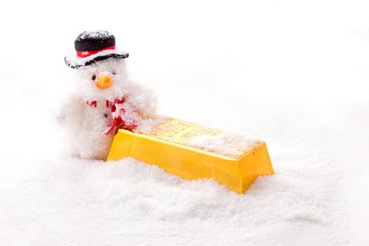 Christmas man with a gold bar in the snow