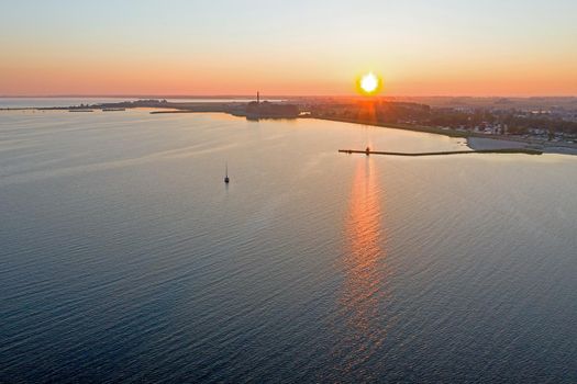 Aerial from a beautiful sunset at the IJsselmeer near Lemmer in the Netherlands