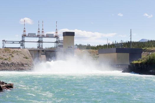 Violent white water in spillway of hydro-electric power plant of the small scale hydro station at Whitehorse, Yukon Territory, Canada