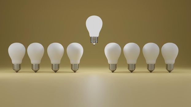 Think different concept a floating glowing idea light bulb standing out from dim unlit bulbs on yellow pastel color wall background leadership and individuality creative idea concepts 3D