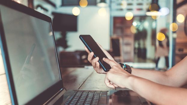  Woman use technology devices smartphone and laptop to work or study do connect communication business concept
