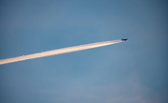 Jet of airplane line at the sky