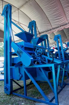 Modern tractor on modern agricultural machinery.