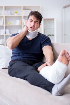 Man injured in car crash recovering at home from whiplash injury and broken leg