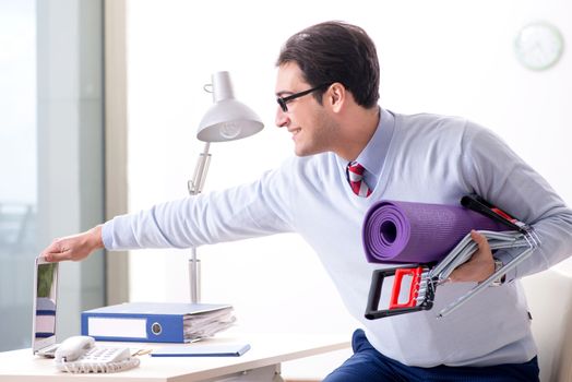 Businessman rushing to gym during lunch break