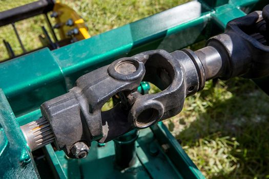 Modern tractor on modern agricultural machinery.