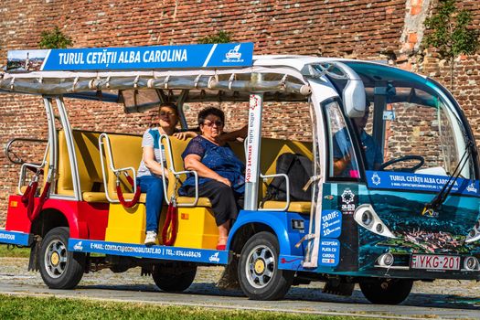 An electric open car for transportation of tourists in Alba Iulia, 2021