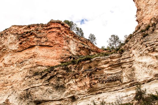 Cave houses in Jorquer village mountain range in Castile-La Mancha, Spain