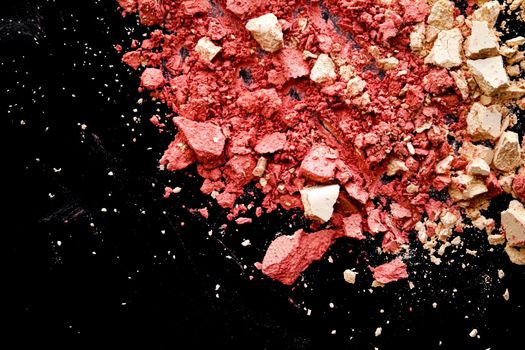 Crushed cosmetics, mineral organic eyeshadow, blush and cosmetic powder isolated on black background, makeup and beauty banner, flatlay design.