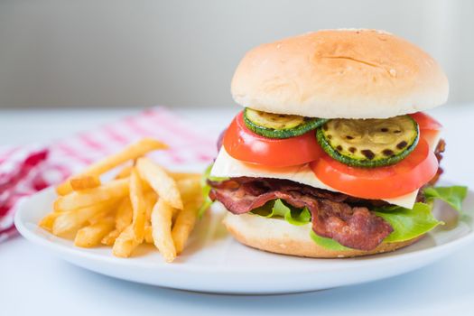 bacon burger with french fries