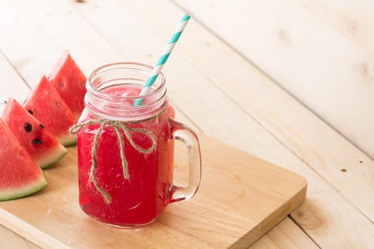 watermelon smoothie on wood background