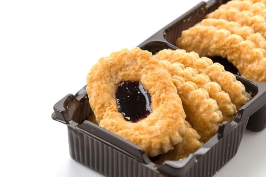 blueberry biscuit pies on white background