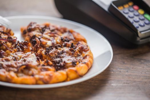 Delicious italian pizzas served on wooden table